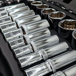 IRONVOLT 218-piece tool set with screwdrivers, pliers, wrenches, and bits arranged in a sturdy plastic case.